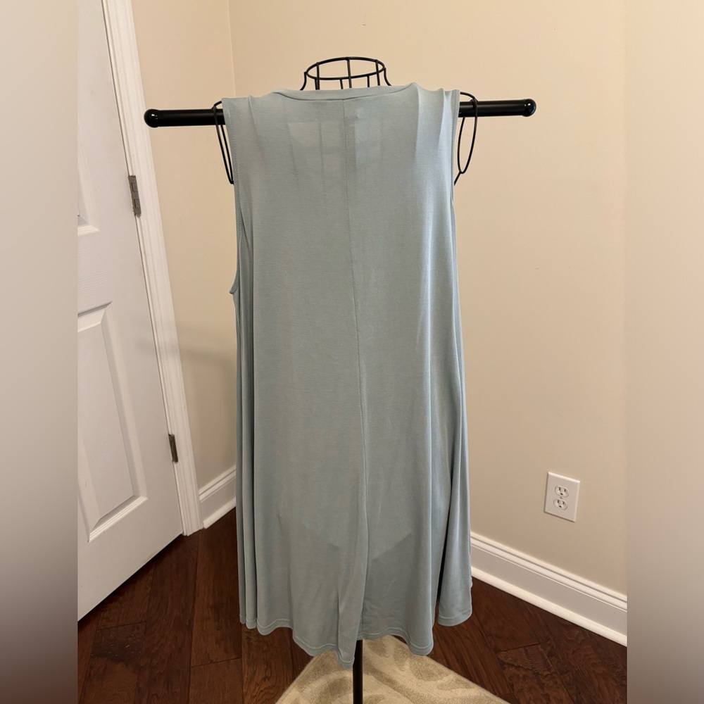 Boutique brand dress with cris-cross, v-neck detail.